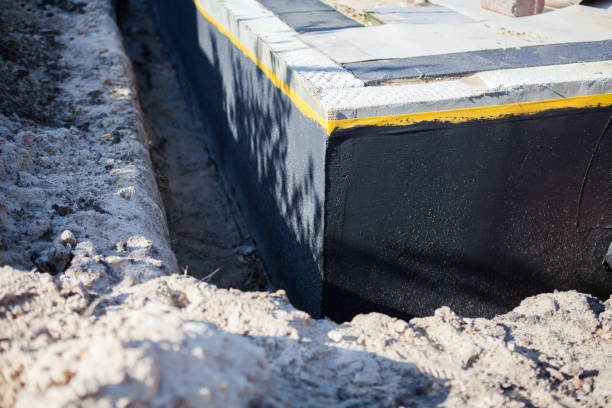 Professional Waterproofing technician working in Jonesboro, IN